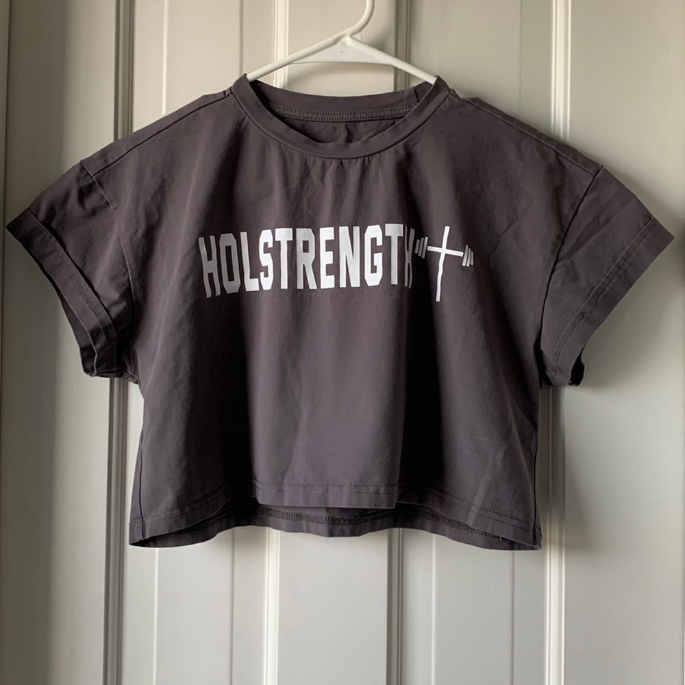 A cropped, dark grey, medium T-shirt from Holstrength.